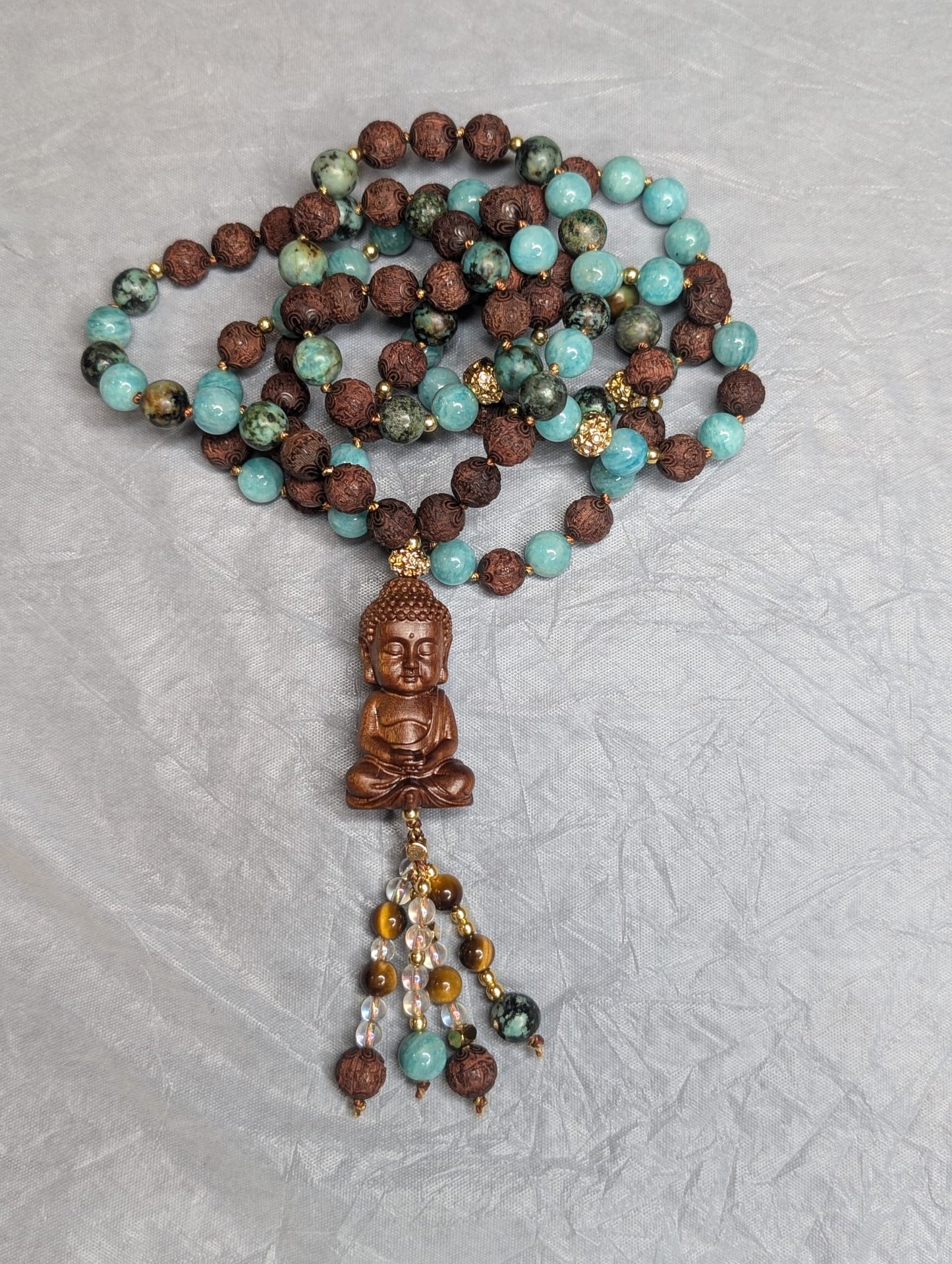 Mala amazonite, turquoise d’Afrique et bois de rose sculpté